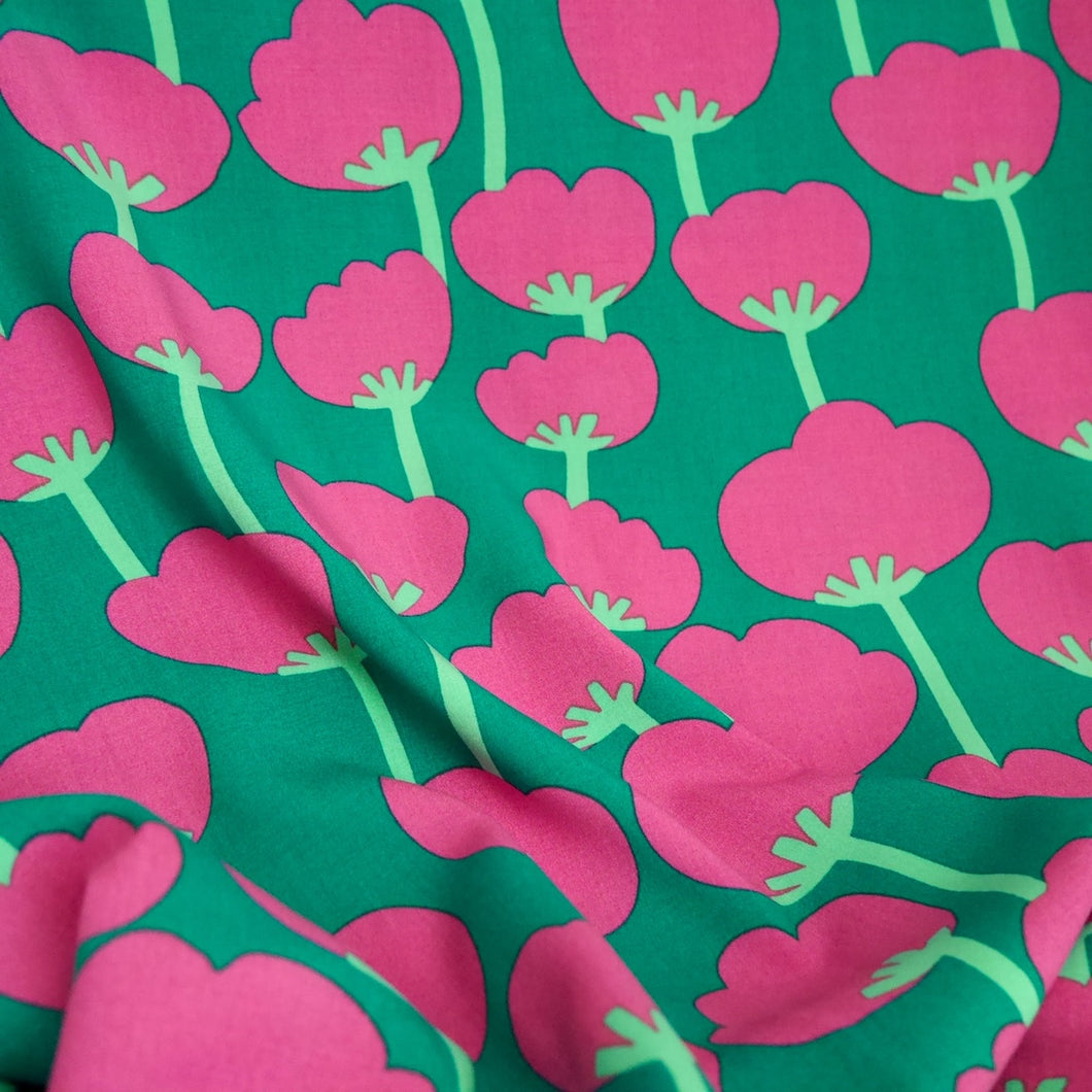 EcoVero Viscose Fabric with Poppies print shown in drape