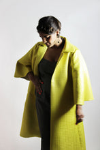 Load image into Gallery viewer, Lady wears a coat with cape style sleeves
