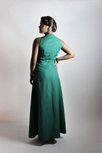 Load image into Gallery viewer, Back view of lady wearing a sleeveless dress with a-line skirt
