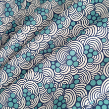 Load image into Gallery viewer, Organic Cotton fabric with abstract waves and bubbles print; fabric in soft folds
