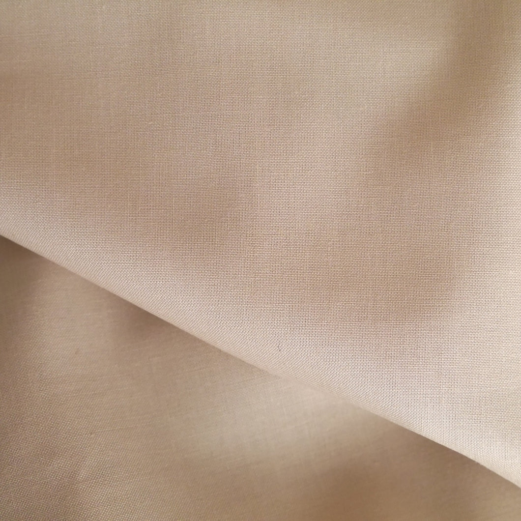 Organic Cotton fabric displayed showing its plain weave