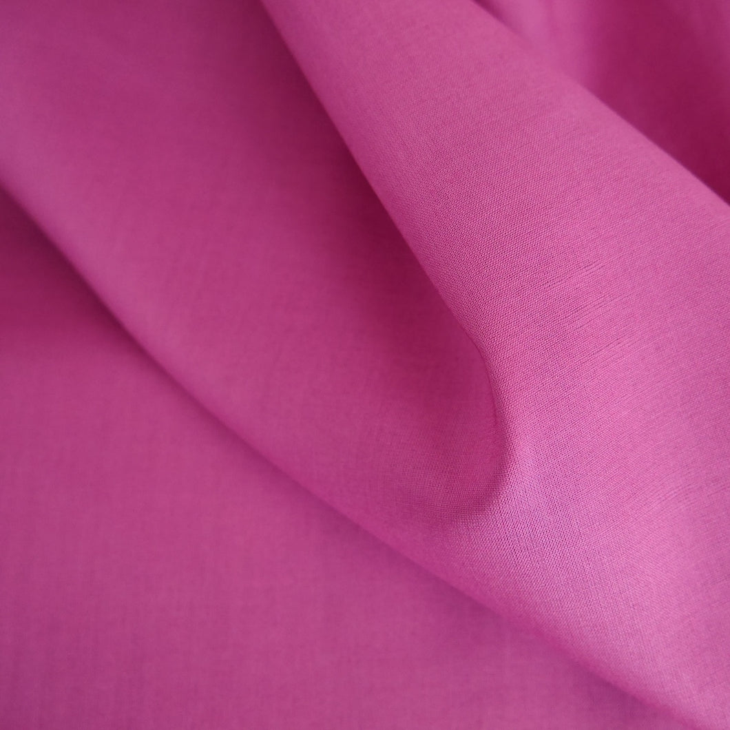 Organic cotton voile fabric draped in soft folds