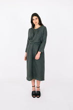 Load image into Gallery viewer, Lady wears a midi length dress with a long sleeve wrap across top
