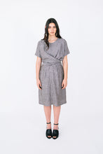Load image into Gallery viewer, Lady wears a knee length dress with a short sleeve wrap across top
