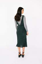 Load image into Gallery viewer, Back view of lady wearing a sleeveless dress with low V back neckline, worn over a long sleeve polo neck top
