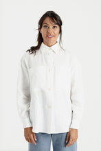 Load image into Gallery viewer, Lady wears a long sleeved, button up shirt with patch pockets at chest
