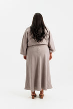 Load image into Gallery viewer, Back view of lady wearing a long puff sleeve bodice, elasticated waist with bias cut skirt, midi length
