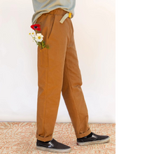 Load image into Gallery viewer, Side view close up of person wearing Rambler Pants: tapered trouser with slant side pocket and small long patch pocket at side
