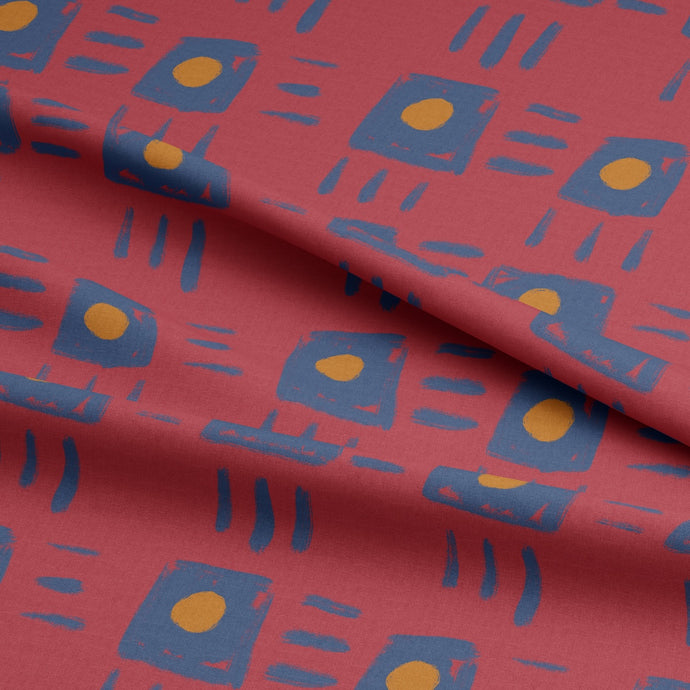 Magnetic Organic Cotton Poplin Fabric shown with soft folds in drape, with a square painted pattern print