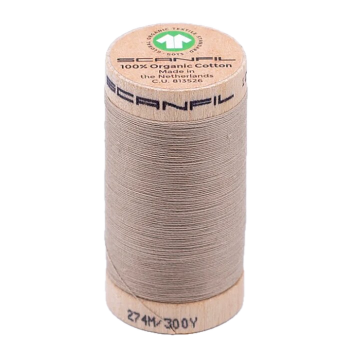Wooden spool of organic cotton sewing thread