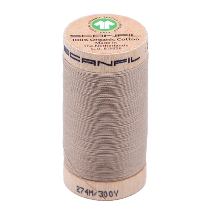 Wooden spool of organic cotton sewing thread