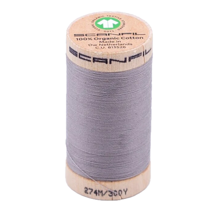 Wooden spool of Scanfil organic cotton sewing thread