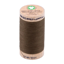 Load image into Gallery viewer, Wooden spool of organic cotton sewing thread with a visible brand label
