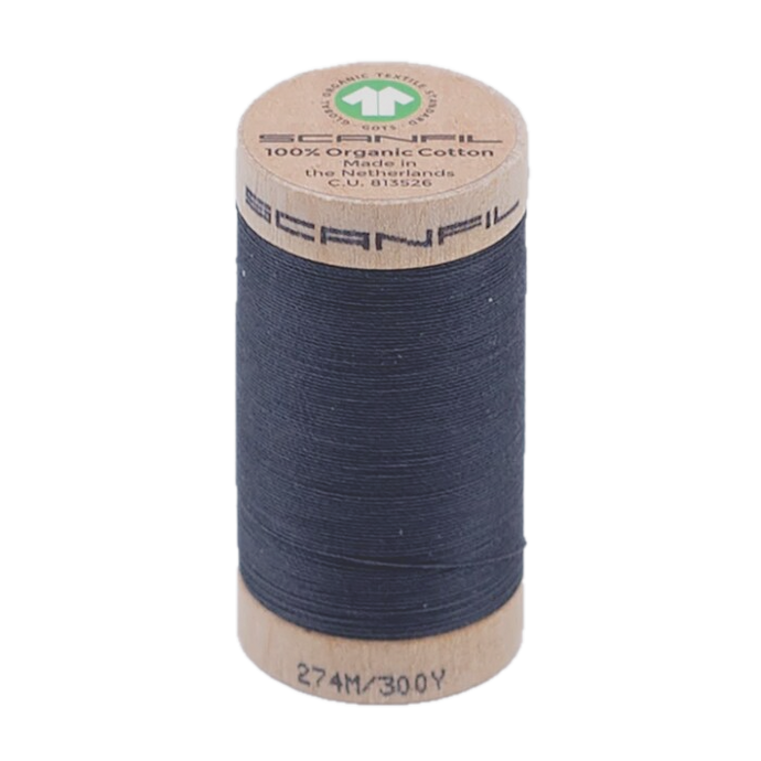 Wooden spool of organic cotton thread