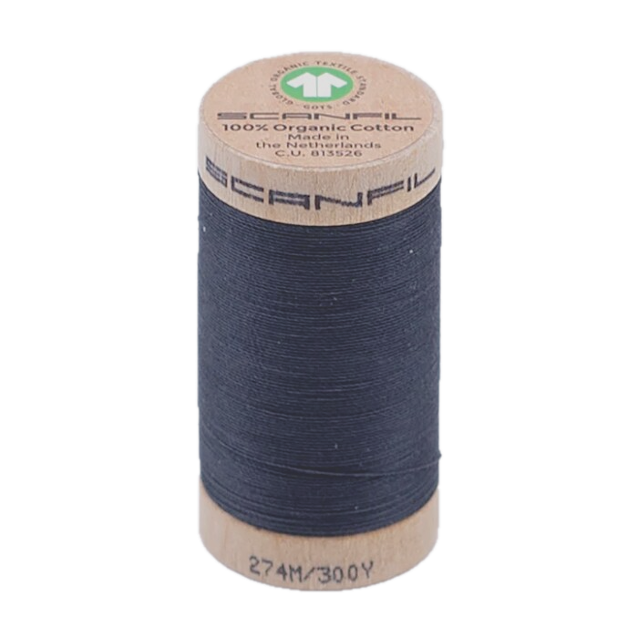 Wooden spool of organic cotton thread