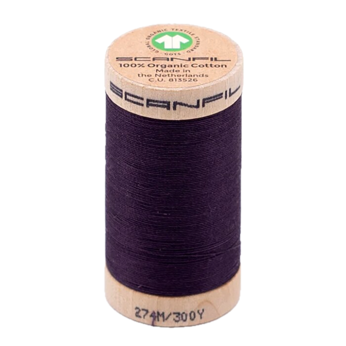 Wooden spool of organic cotton sewing thread