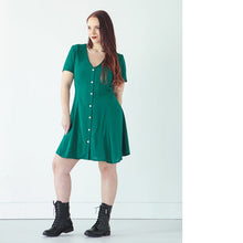 Load image into Gallery viewer, Lady wears The Shelby Dress, a princess seamed V neck button front dress, short sleeve, above knee length
