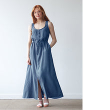 Load image into Gallery viewer, Lady wears The Southport Dress by True Bias: a button up front tank top with elasticated waist and A-line maxi skirt with split up centre front to knee
