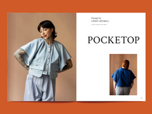 Load image into Gallery viewer, Two-page magazine spread features two images of models front and back views wearing a loose, short-sleeved top with giant pockets at front, alongside a page titled "Pocketop"
