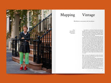 Load image into Gallery viewer, Magazine spread features photo of lady at the bottom of apartment block stairs next to an article titled &quot;Mapping Vintage&quot;.
