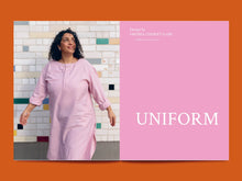 Load image into Gallery viewer, Lady wears a tunic dress next to bold print title: &quot;Uniform&quot;.

