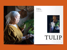 Load image into Gallery viewer, Magazine spread features a photo of lady in a v-neck top and gathered sleeve head, with sheer headscarf, alongside article title: &quot;Tulip&quot;
