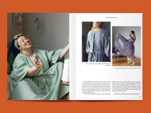 Load image into Gallery viewer, Magazine spread features photos of women wearing a loose fitting bodice and gathered skirt dress, amongst blocks of text
