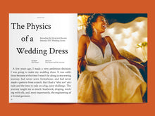Load image into Gallery viewer, Two page spread features an image of a lady sat down laughing in a strappy bodice wedding dress, besides a page of text titled &quot;The Physics of a Wedding Dress&quot;
