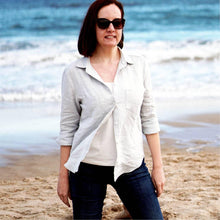 Load image into Gallery viewer, Lady wears Anna Shirt in a casual manner, worn open over a plain top, fastened with one button at chest. Long sleeves rolled up to elbow
