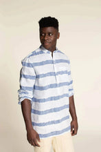 Load image into Gallery viewer, Model wears a long sleeve shirt with half placket and collar stand, sleeves pushed up
