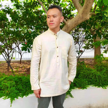 Load image into Gallery viewer, Model wears a long sleeve shirt with half placket and collar stand
