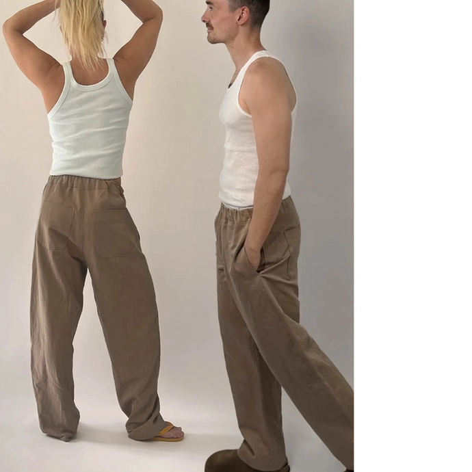 Two models wearing plain tank tops with elasticated trousers