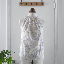 Load image into Gallery viewer, Halterneck neck displayed on mannequin, made with Swan Lake Cotton Lawn fabric
