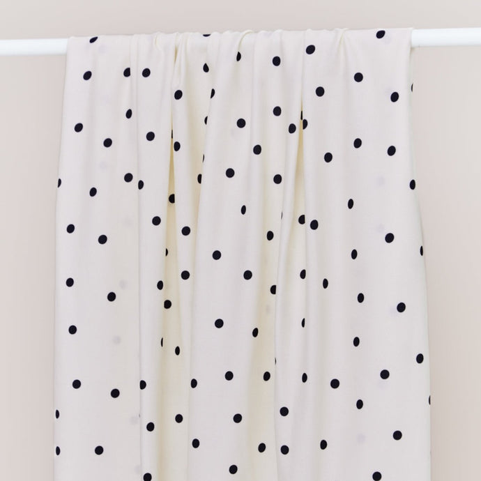EcoVero Viscose fabric with dots print over a rail
