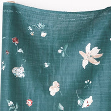 Load image into Gallery viewer, Close up of Organic Cotton Double Gauze fabric with florals floating around
