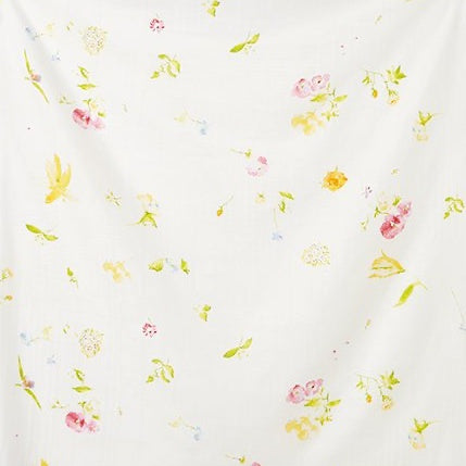 Scattered florals across organic cotton double gauze fabric