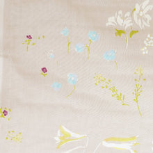 Load image into Gallery viewer, Close up of Organic Cotton Double Gauze fabric shows a watercolour floral print
