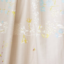 Load image into Gallery viewer, Close up of Organic Cotton Double Gauze fabric in drape, showing a watercolour floral print
