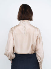 Load image into Gallery viewer, Back view of Tie Bow Blouse shows stand collar fastening with five buttons down centre back.
