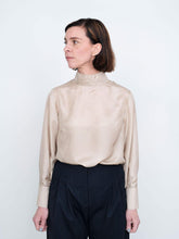 Load image into Gallery viewer, Front view of lady wearing blouse without the Tie Bow
