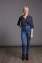 Load image into Gallery viewer, Front view of lady wearing The Blouse tucked into jeans.
