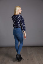 Load image into Gallery viewer, Back view of lady wearing The Blouse in bird print fabric, tucked into jeans.
