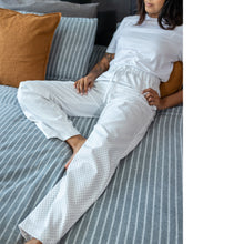 Load image into Gallery viewer, Lady laid on bed wearing The Pyjama Bottoms
