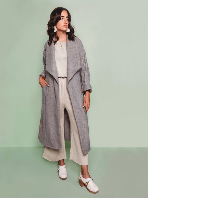 Lady wears Cambria Duster Coat with hand in pocket.