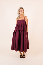 Load image into Gallery viewer, Lady stands wearing a Celestia tier dress with a drawstring square neckline
