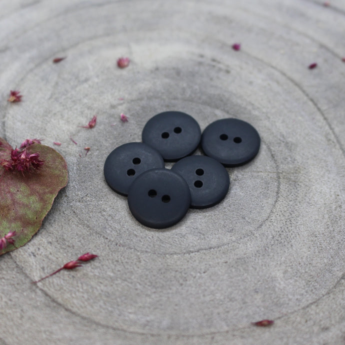 Five dark blue matte buttons with 2 sewing holes.