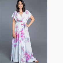 Load image into Gallery viewer, Lady wears a full length Elodie Wrap Dress
