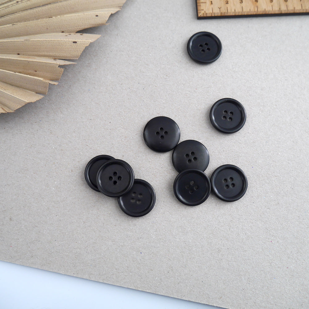 23mm diameter Corozo buttons scattered