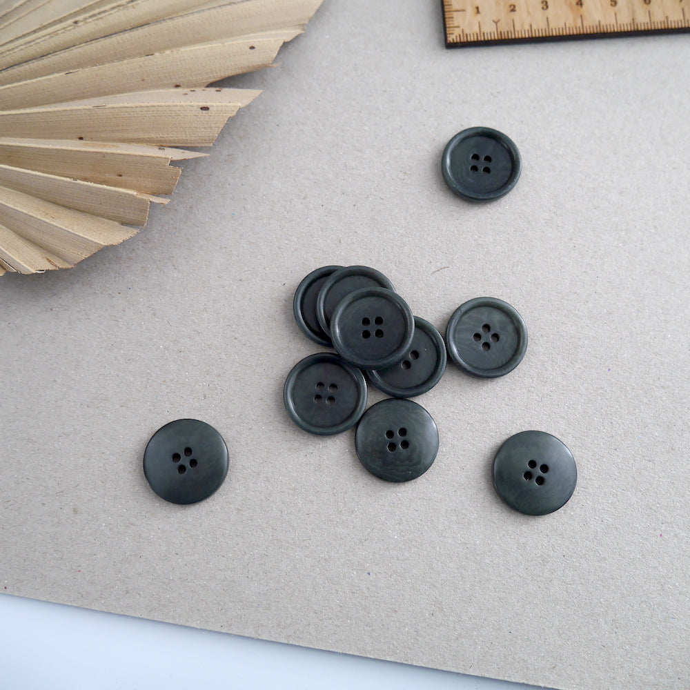 23mm diameter Corozo buttons scattered