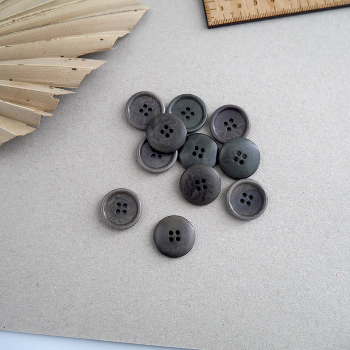 23mm diameter Corozo buttons scattered